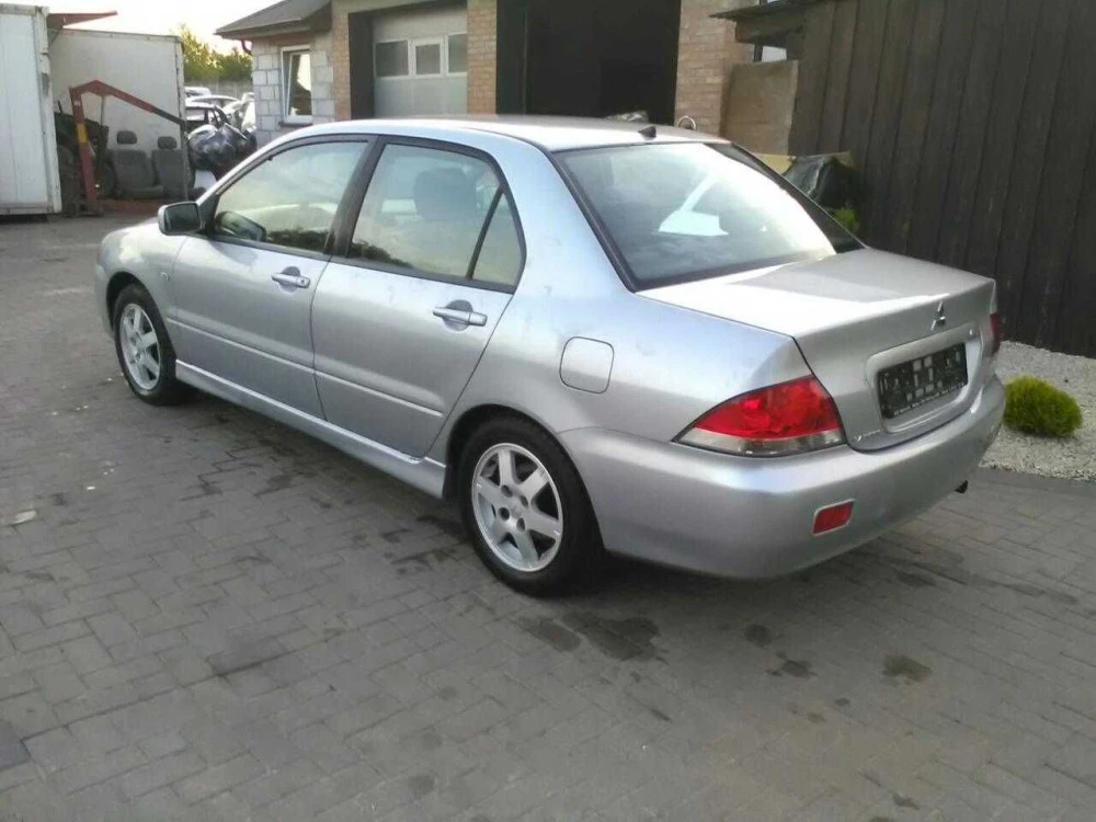 кузовщина,кузовні запчасти для Mitsubishi Lancer 9