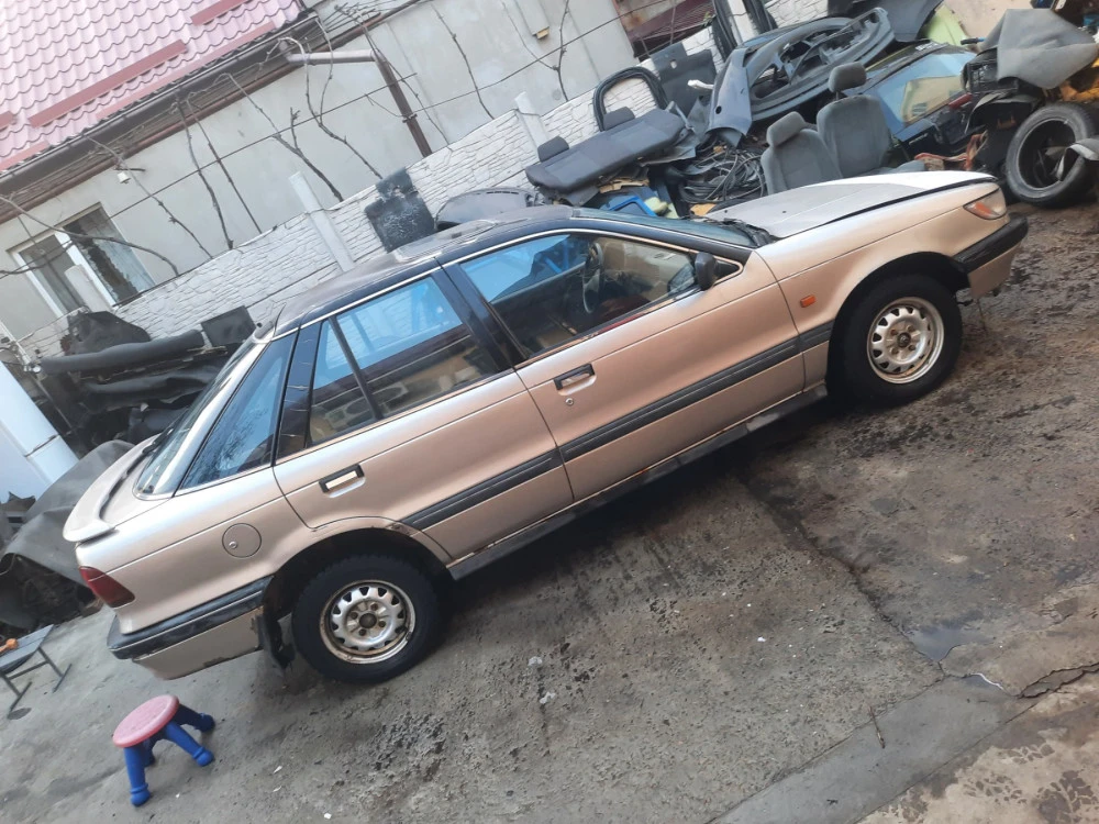 MB023245 Замок лючка бензобака Mitsubishi Galant Lancer Colt E32 (1987-1993)