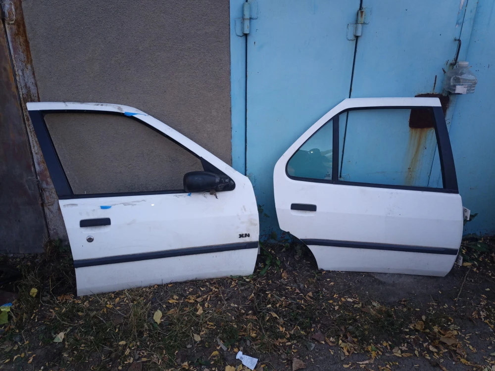 Двері Peugeot 306