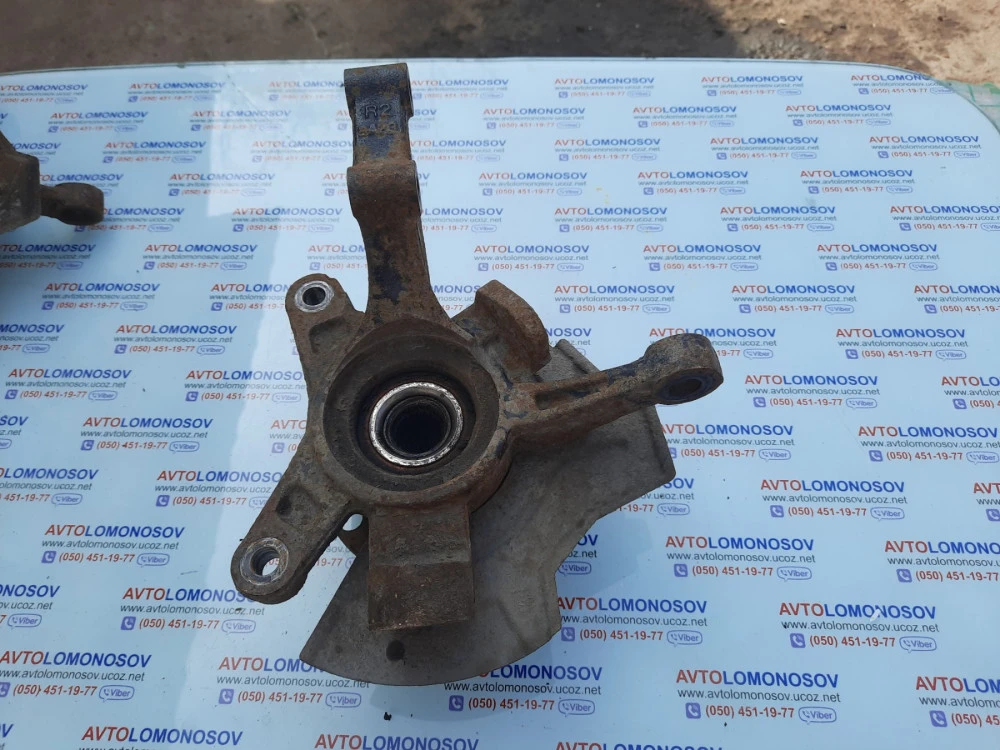 96459242 Поворотный кулак Chevrolet Aveo 96459243
