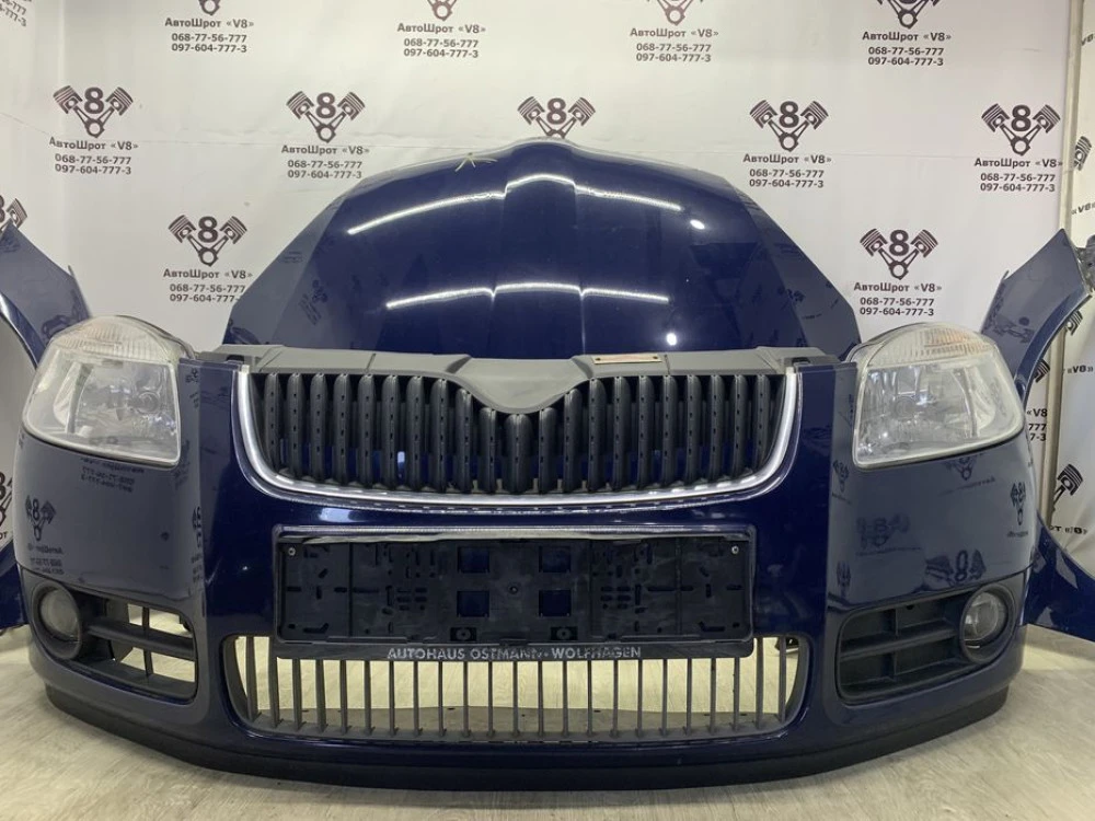 Skoda Roomster Fabia Румстер Фабія фара бампер крило капот радіатор