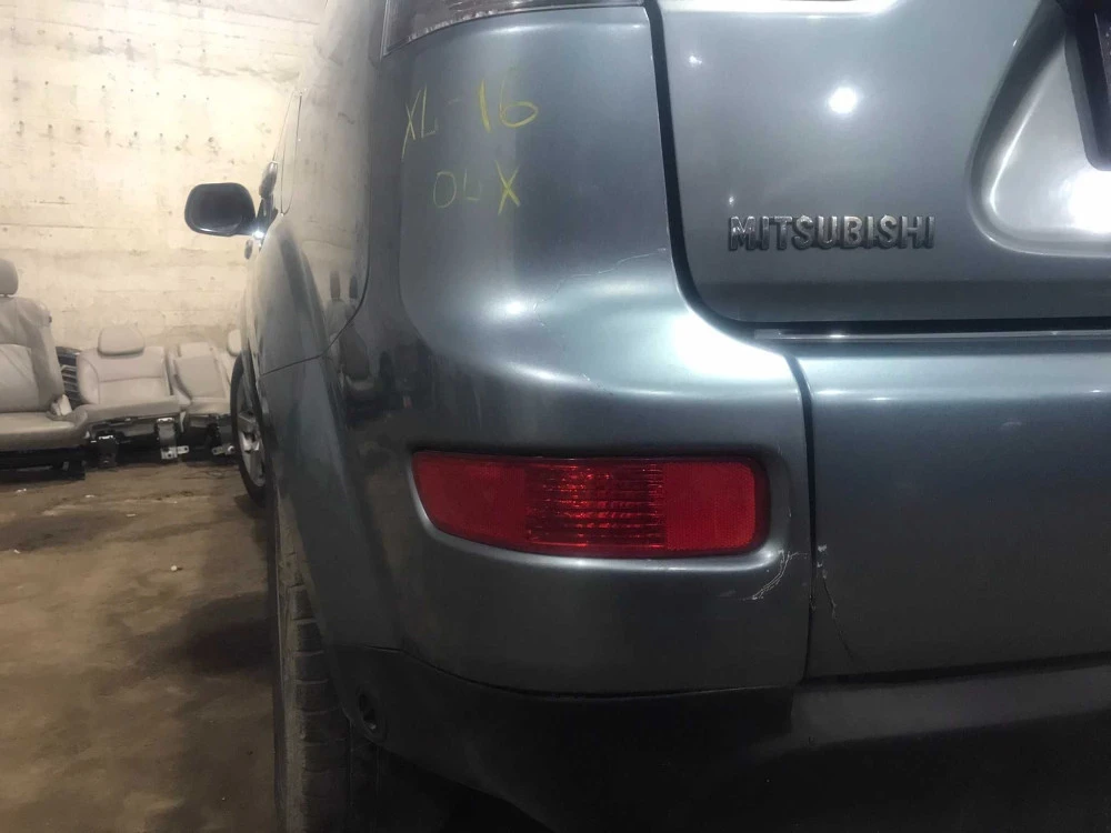 Задній бампер,клик бампера для Mitsubishi Outlander XL 2007-2012pp