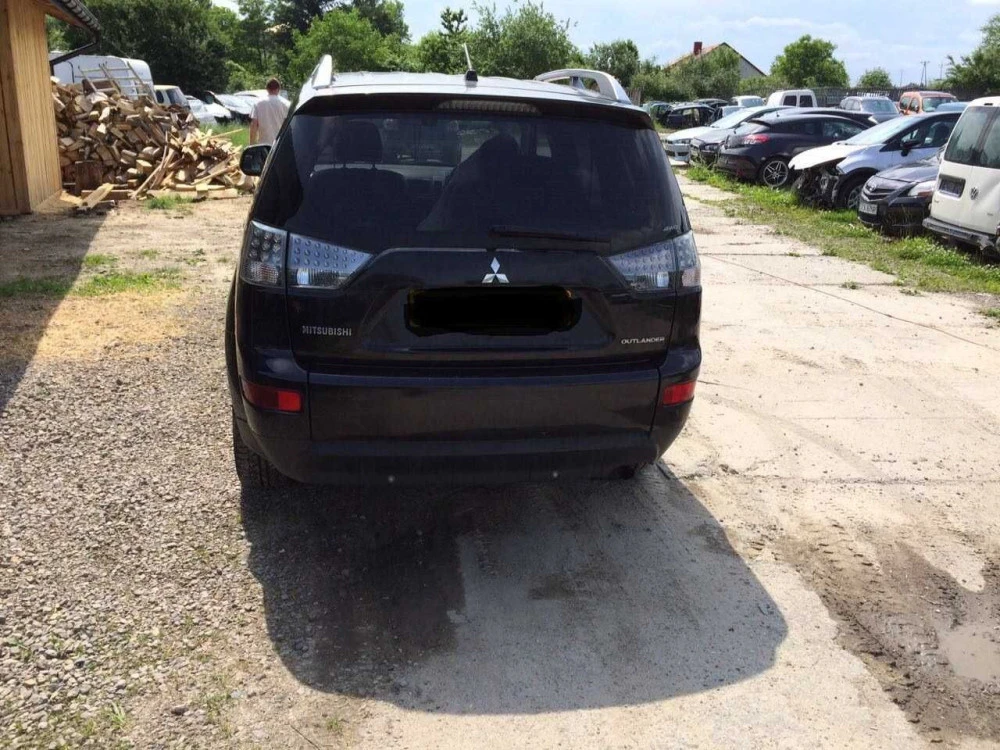 Mitsubishi Outlander XL автозапчастини,кузовщина Б/у оригінал