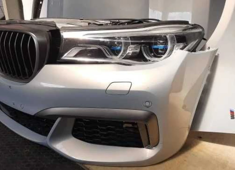 Бампер  BMW 7 G11 X04 2015-2018 капот/фари БМВ